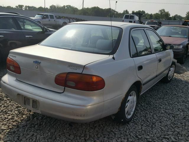 1Y1SK5288XZ410209 - 1999 CHEVROLET GEO PRIZM BLACK photo 4