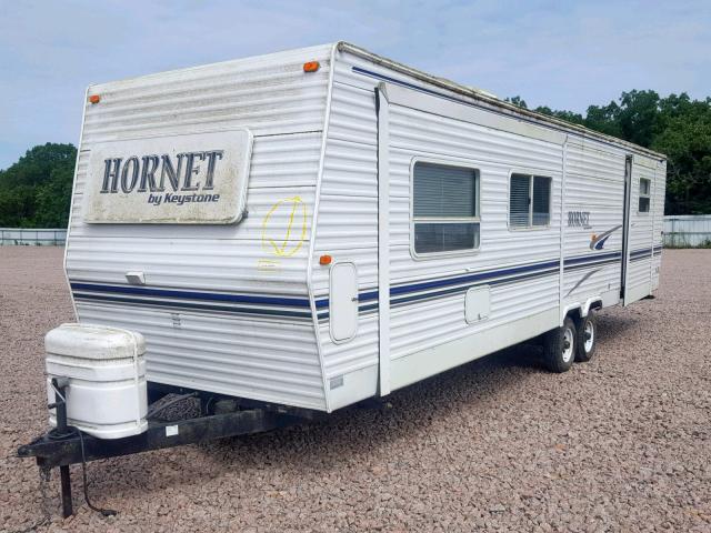 4YDT33F2430308546 - 2003 KEYSTONE HORNET WHITE photo 2