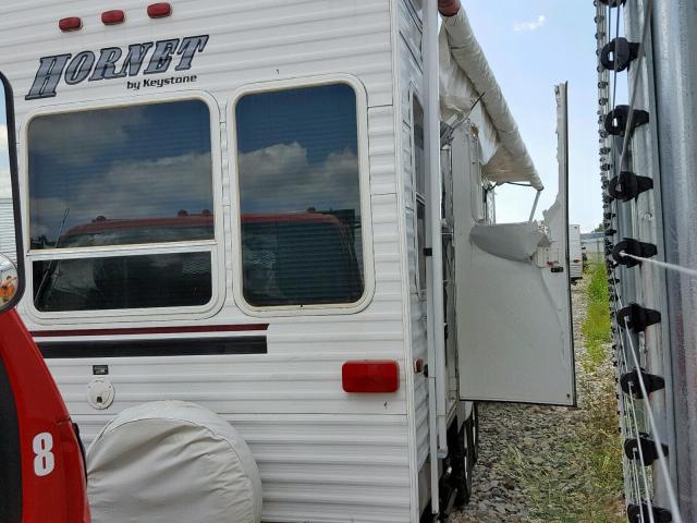 4YDT27R215E317359 - 2005 KEYSTONE HORNET WHITE photo 4