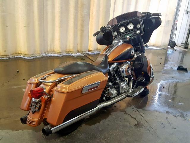 1HD1KB4438Y653859 - 2008 HARLEY-DAVIDSON FLHX 105TH ORANGE photo 4