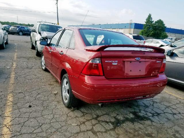 1FAHP34N05W126293 - 2005 FORD FOCUS ZX4 RED photo 3