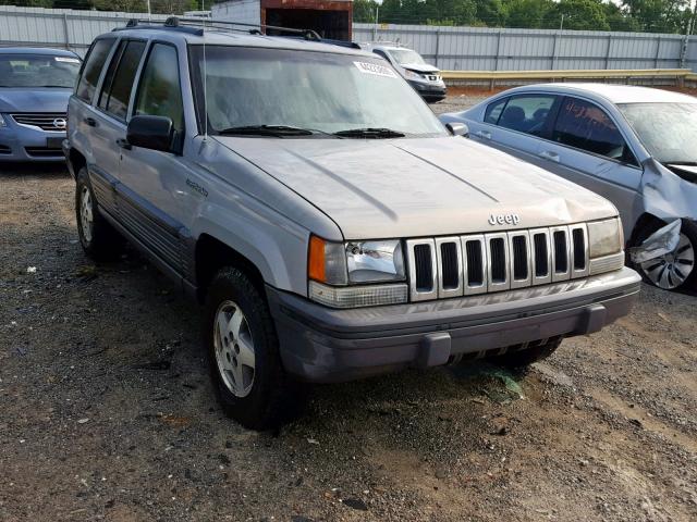 1J4GZ58Y1RC330635 - 1994 JEEP GRAND CHER SILVER photo 1