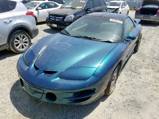 2G2FV22G6Y2137332 - 2000 PONTIAC FIREBIRD F GREEN photo 2