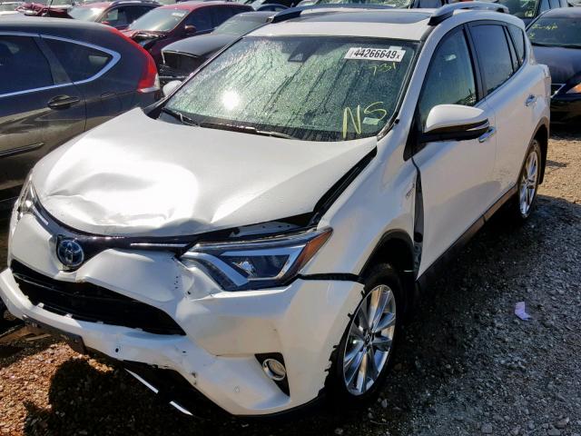 JTMDJREV2GD054538 - 2016 TOYOTA RAV4 HV LI WHITE photo 2