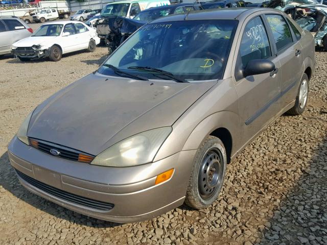 1FAFP33Z04W146277 - 2004 FORD FOCUS LX GOLD photo 2