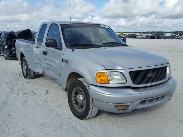 2FTRX17244CA69532 - 2004 FORD F-150 HERI GRAY photo 1