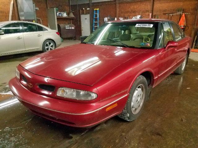 1G3HC52K8X4827494 - 1999 OLDSMOBILE 88 50TH AN RED photo 2