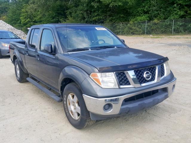 1N6AD09U27C440743 - 2007 NISSAN FRONTIER C GRAY photo 1