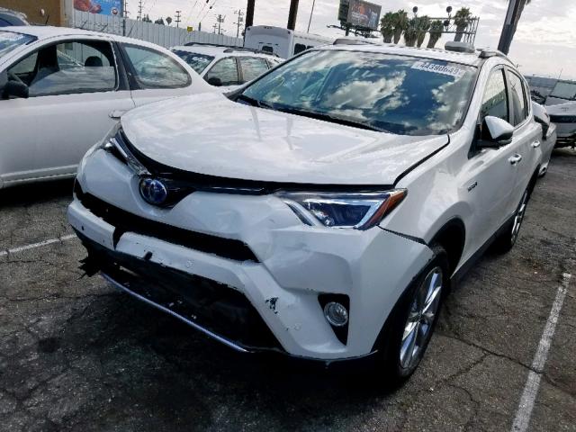 JTMDJREV1JD155027 - 2018 TOYOTA RAV4 HV LI WHITE photo 2