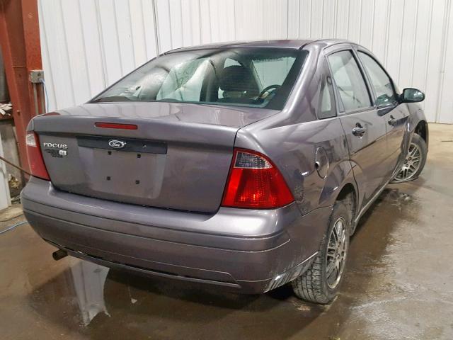 1FAHP34N57W221158 - 2007 FORD FOCUS ZX4 GRAY photo 4