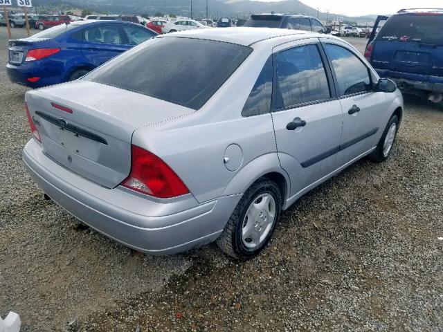 1FAFP33P61W180802 - 2001 FORD FOCUS LX SILVER photo 4