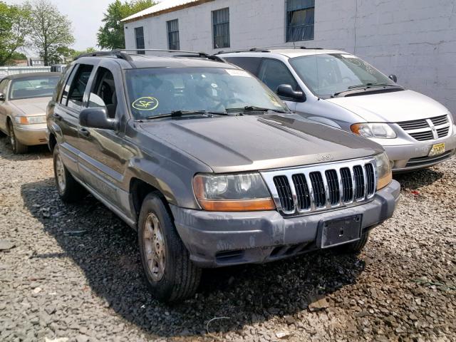 1J4GW48S3YC274047 - 2000 JEEP GRAND CHER GRAY photo 1