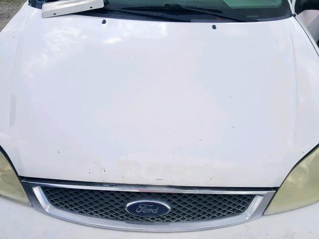 1FAFP34N65W143459 - 2005 FORD FOCUS ZX4 WHITE photo 7