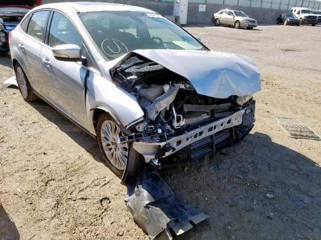 1FAHP3J2XCL386211 - 2012 FORD FOCUS TITA SILVER photo 1