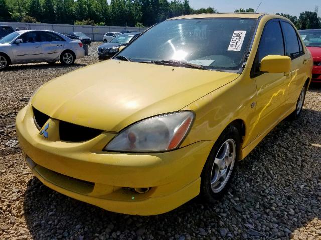 JA3AJ86E84U018584 - 2004 MITSUBISHI LANCER OZ YELLOW photo 2