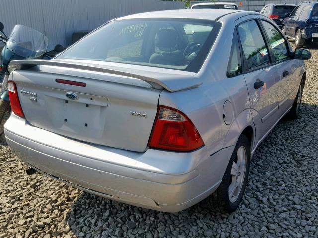 1FAHP34N25W291780 - 2005 FORD FOCUS ZX4 GRAY photo 4