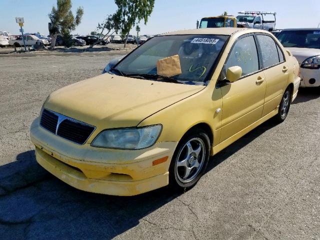 JA3AJ86E62U077341 - 2002 MITSUBISHI LANCER OZ YELLOW photo 2