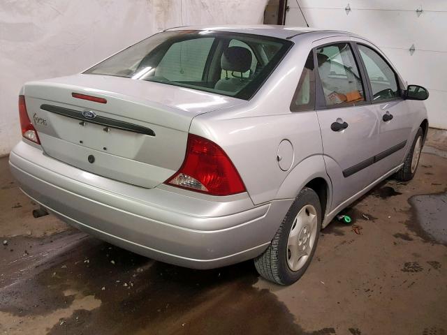 1FAFP33P03W309023 - 2003 FORD FOCUS LX SILVER photo 4