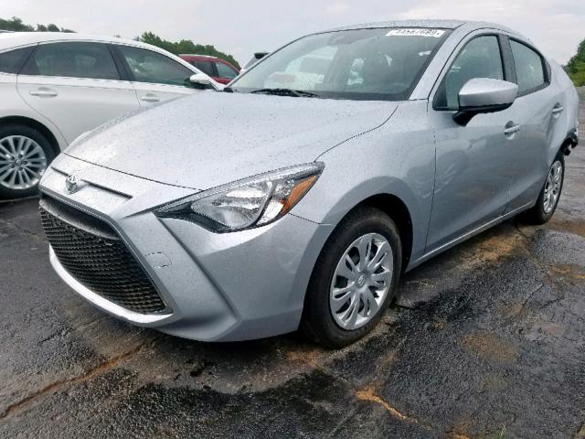 3MYDLBYV9KY523242 - 2019 TOYOTA YARIS L SILVER photo 2