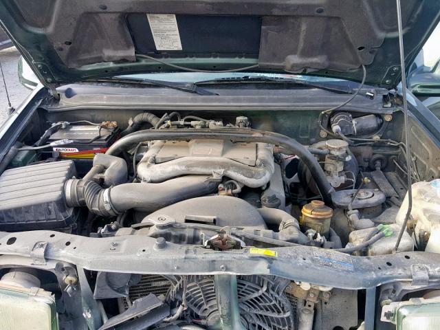 2CNBE634X46902787 - 2004 CHEVROLET TRACKER LT GREEN photo 7