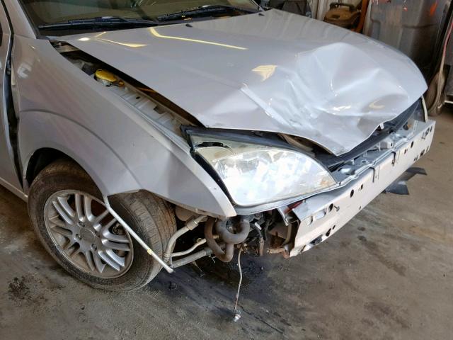 1FAFP34N57W244642 - 2007 FORD FOCUS ZX4 SILVER photo 9