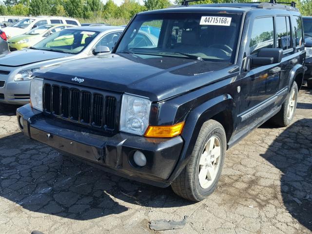 1J8HG48N76C275399 - 2006 JEEP COMMANDER BLACK photo 2