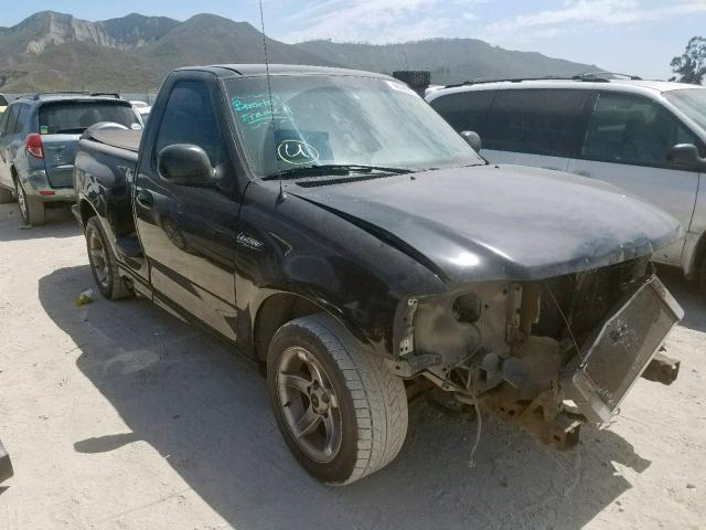 2FTZF0734XCA95137 - 1999 FORD F150 SVT L BLACK photo 1