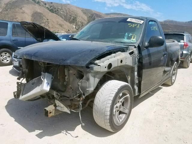 2FTZF0734XCA95137 - 1999 FORD F150 SVT L BLACK photo 2