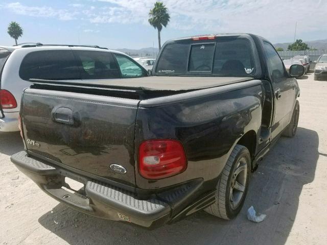 2FTZF0734XCA95137 - 1999 FORD F150 SVT L BLACK photo 4