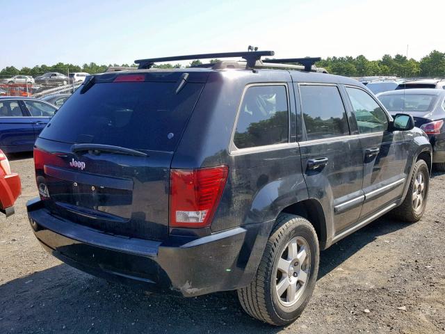 1J8GR48K28C144525 - 2008 JEEP GRAND CHER BLACK photo 4