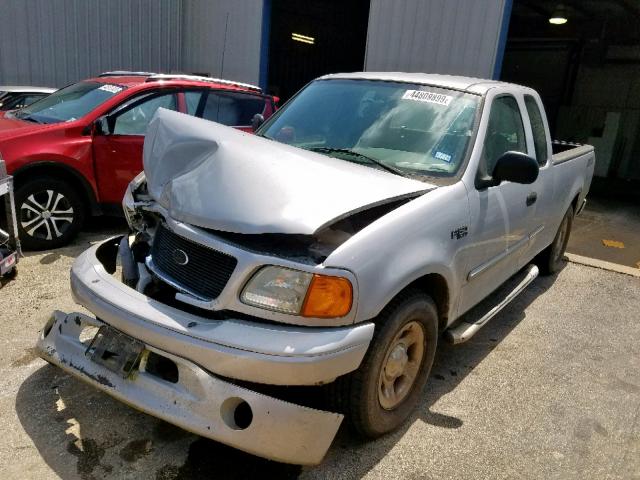 2FTRX17214CA73179 - 2004 FORD F-150 HERI SILVER photo 2