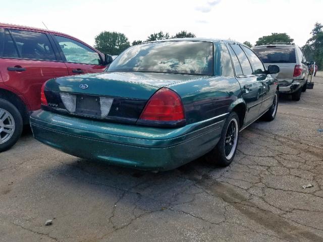 2FAFP71W6YX208694 - 2000 FORD CROWN VICT GREEN photo 4