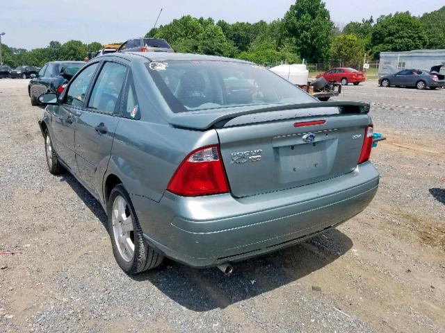 1FAHP34N05W233330 - 2005 FORD FOCUS ZX4 GREEN photo 3