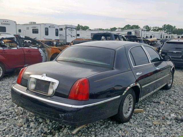 1LNHM83W91Y680436 - 2001 LINCOLN TOWN CAR C BLACK photo 4