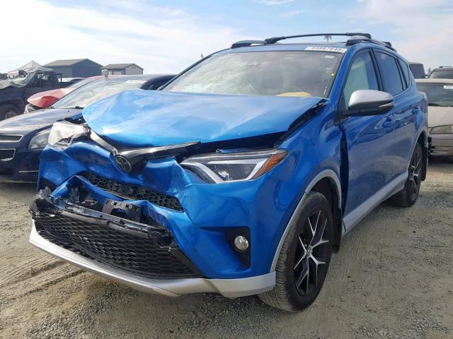 JTMJFREV9GJ060519 - 2016 TOYOTA RAV4 SE BLUE photo 2