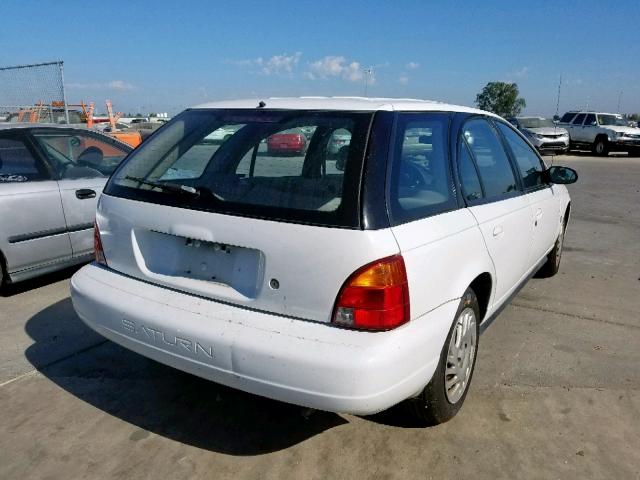 1G8ZK8271XZ173004 - 1999 SATURN SW2 WHITE photo 4