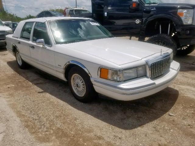 1LNLM83W4RY617234 - 1994 LINCOLN TOWN CAR C WHITE photo 1