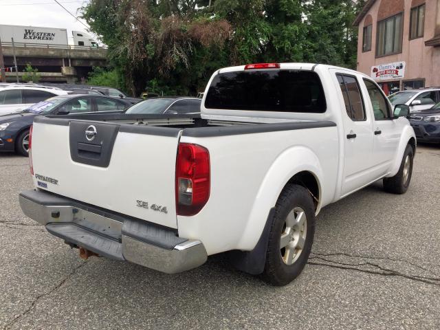 1N6AD09W97C407837 - 2007 NISSAN FRONTIER C WHITE photo 4