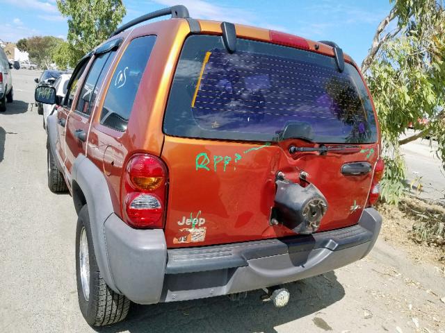 1J4GK48KX2W139519 - 2002 JEEP LIBERTY SP ORANGE photo 9