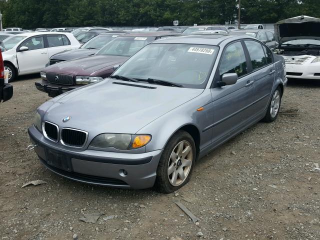 WBAAZ33415KP91447 - 2005 BMW 325 IS SUL GREEN photo 2