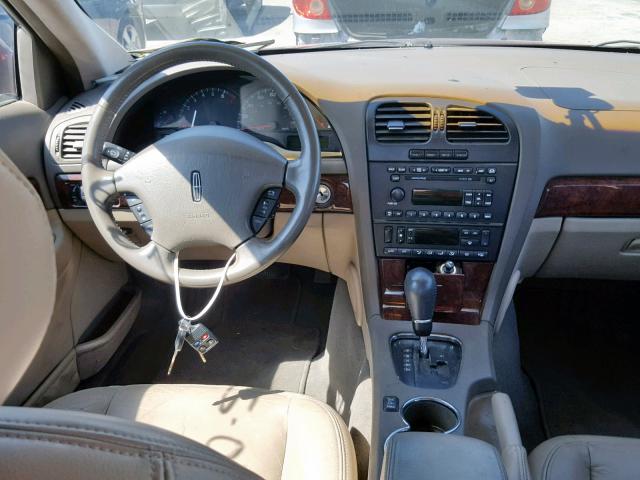 1LNHM87A31Y618187 - 2001 LINCOLN LS მუქწითელი ფოტო 9