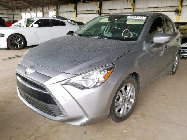 3MYDLBZV3GY105085 - 2016 TOYOTA SCION IA SILVER photo 2