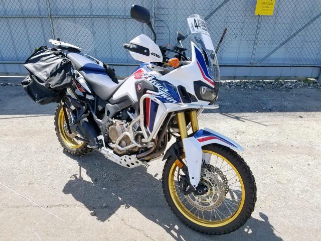 JH2SD04G3HK000697 - 2017 HONDA CRF1000 WHITE photo 1