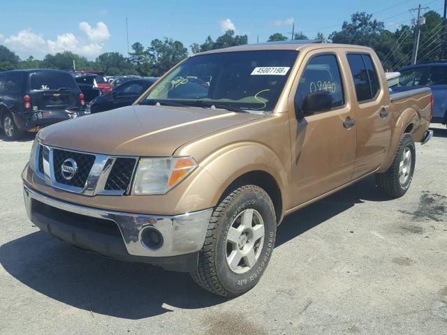 1N6AD07U25C408911 - 2005 NISSAN FRONTIER C ORANGE photo 2