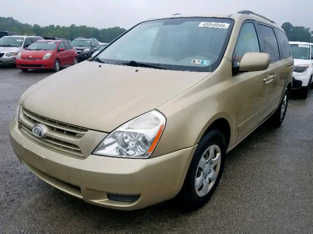 KNDMG4C35A6357327 - 2010 KIA SEDONA LX GOLD photo 2