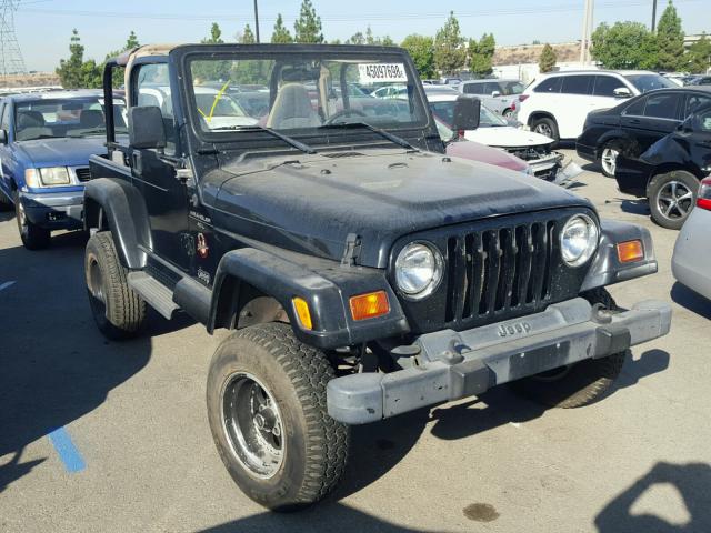 1J4FY49S3XP489276 - 1999 JEEP WRANGLER / BLACK photo 1