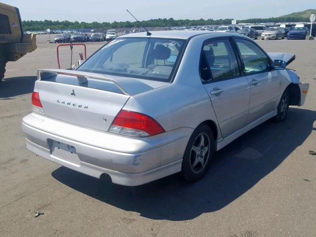 JA3AJ86EX3U061239 - 2003 MITSUBISHI LANCER OZ SILVER photo 4