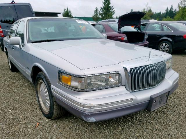 1LNLM82W7VY618986 - 1997 LINCOLN TOWN CAR SILVER photo 1