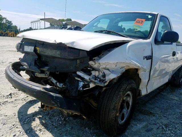 2FTRF17264CA46899 - 2004 FORD F-150 HERI WHITE photo 9