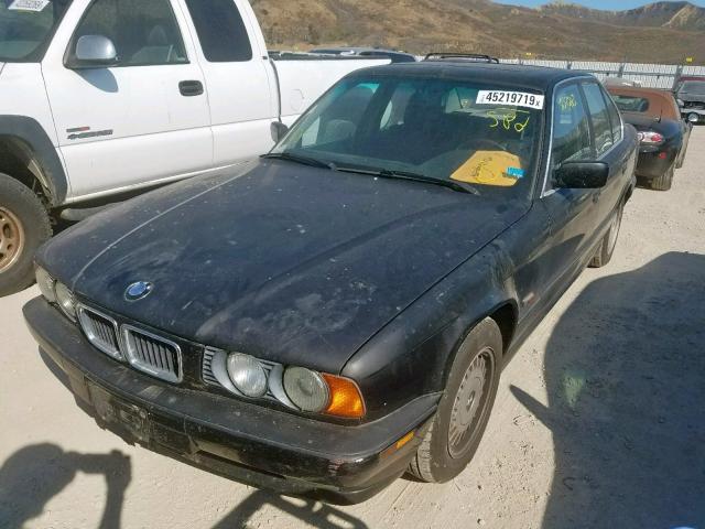 WBAHD6324SGK81721 - 1995 BMW 525 I AUTO BLACK photo 2